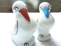 Porcelaine de Limoges - Salière + poivrière signées - Cigognes